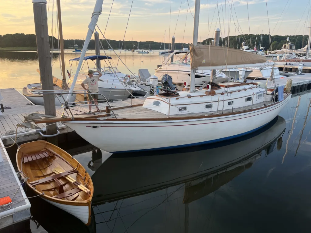 sailboat and dingy at the dock